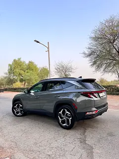 Rent a 2024 Hyundai Tucson in Dubai Sports City photo 2