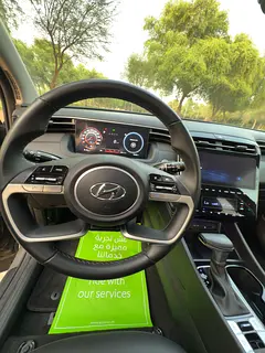 Rent a 2024 Hyundai Tucson in Dubai Sports City photo 5