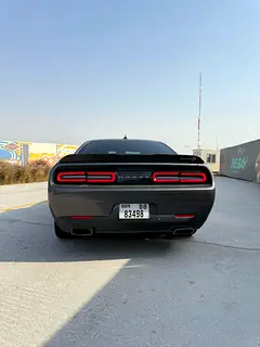 Rent a 2022 Dodge Challenger in Al Muraqqabat photo 6