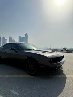 Rent a 2022 Dodge Challenger in Al Muraqqabat photo 7