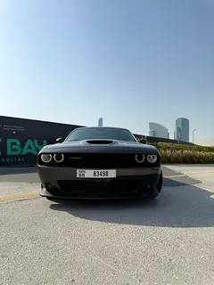 Rent a 2022 Dodge Challenger in Al Muraqqabat photo 8