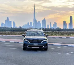 Rent a 2024 Kia Carnival in Al Garhoud photo 2