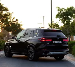 Rent a 2024 BMW X5 in Dubai International Airport photo 2