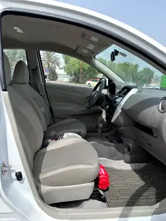 Rent a 2023 Nissan Sunny in Al Quoz Industrial Area 3 photo 2