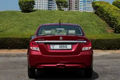 Rent a 2023 Suzuki Dzire in Dubai Sports City photo 2