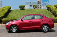 Rent a 2023 Suzuki Dzire in Dubai Sports City photo 3