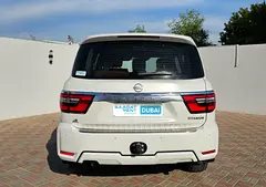 Rent a 2023 Nissan Patrol in Al Rashidiya photo 3