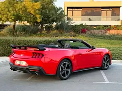 Rent a 2024 Ford Mustang in DAMAC Hills photo 5