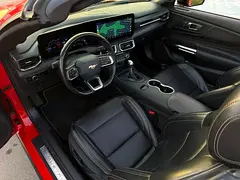 Rent a 2024 Ford Mustang in DAMAC Hills photo 6