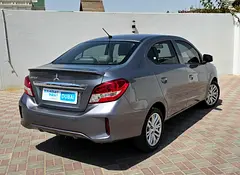 Rent a 2023 Mitsubishi Attrage in Al Rashidiya photo 2