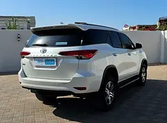 Rent a 2025 Toyota Fortuner in Al Rashidiya photo 2