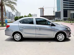 Rent 2022 Mitsubishi Attrage in Dubai Creek Harbour photo 3