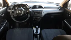 Rent a 2024 Suzuki Dzire in Al Karama photo 3