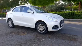 Rent a 2024 Suzuki Dzire in Al Karama photo 5