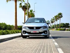 Rent 2026 Suzuki Baleno in Downtown Dubai photo 2