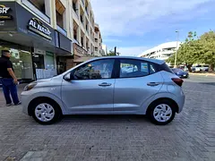 Rent a 2025 Hyundai Grand i10 in Al Karama photo 3