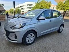 Rent a 2025 Hyundai Grand i10 in Al Karama photo 5