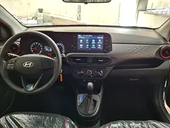 Rent a 2025 Hyundai Grand i10 in Al Karama photo 8