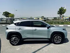Rent a 2024 Suzuki Fronx in Nad Al Sheba 3 photo 4
