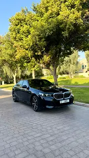 Rent a 2024 BMW 5-Series in Dubai Sports City photo 3