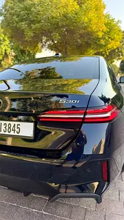 Rent a 2024 BMW 5-Series in Dubai Sports City photo 5