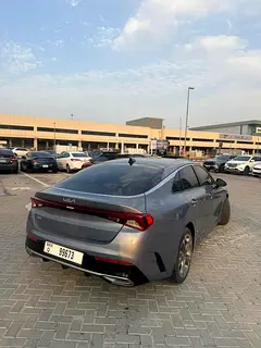 Rent a 2023 Kia K5 in Airport Road Area photo 3