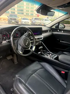Rent a 2023 Kia K5 in Airport Road Area photo 5