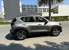 Rent 2023 Kia Sonet in Dubai Sports City photo 3