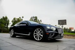 Rent a 2023 Bentley Continental GT in Business Bay photo 2