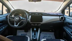 Rent a 2024 Nissan Sunny in Emirates Golf Club Residences photo 6