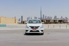 Hire 2023 Nissan Sunny in Al Quoz Industrial Area 3 photo 2