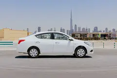 Hire 2023 Nissan Sunny in Al Quoz Industrial Area 3 photo 3
