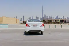 Hire 2023 Nissan Sunny in Al Quoz Industrial Area 3 photo 5