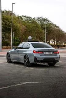 Rent a 2024 BMW 3-Series in Al Garhoud photo 3