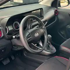Hire 2025 Hyundai Grand i10 in Jumeirah Lake Towers (JLT) photo 6