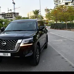 2024 Nissan Patrol Rental in JVC District 13 photo 3